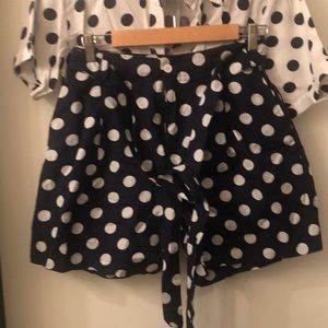 Matching set- navy &white polka dot pleated shorts and cuffed button down shirt